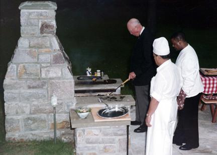 Eisenhower cooking for friends in 1960